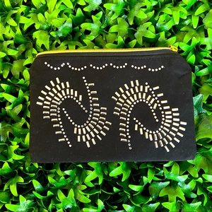 New small black clutch or bag insert for storage.